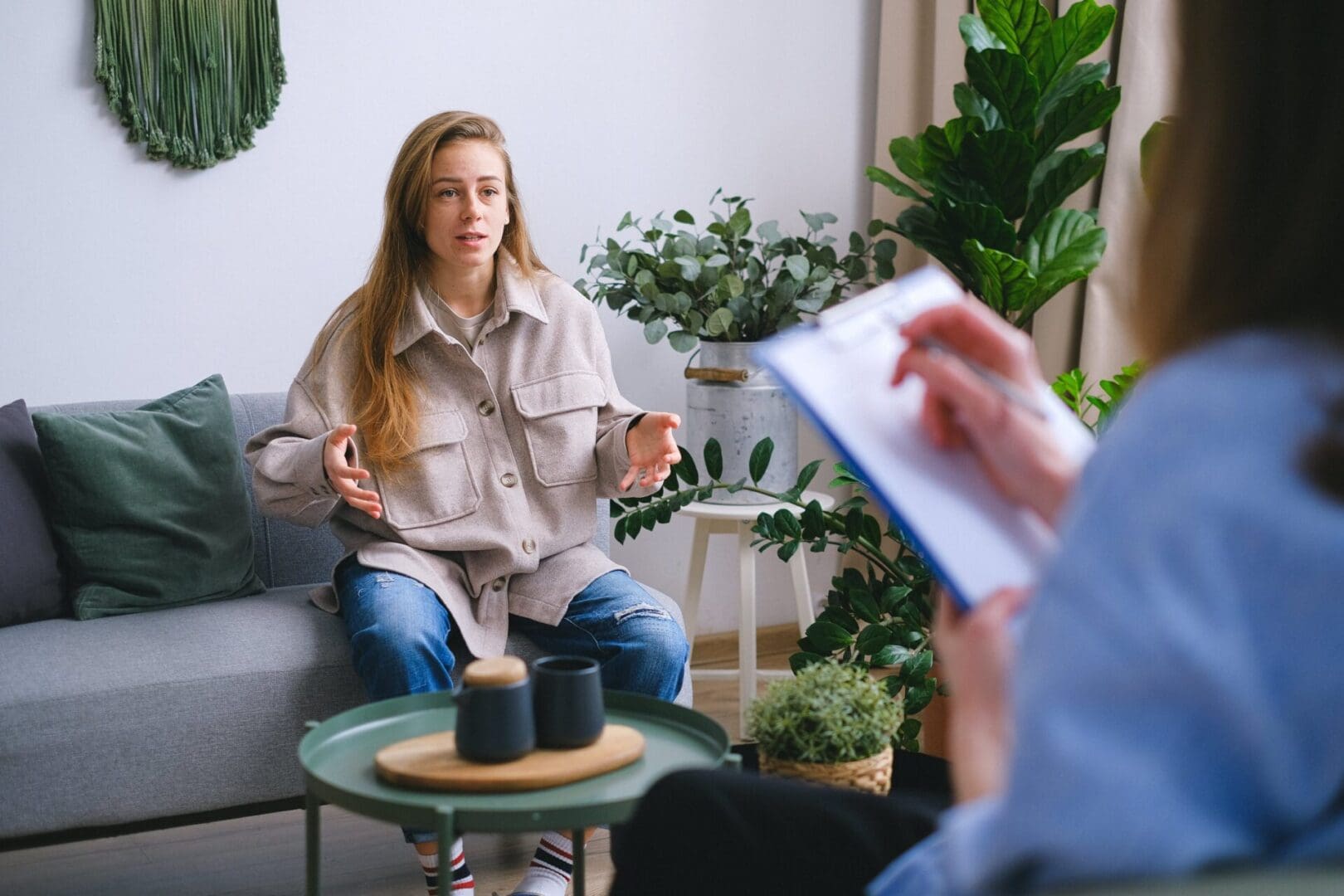 a woman talking with a counselor